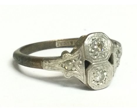 A platinum and gold diamond ring, overall weight 2g