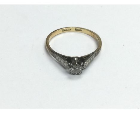 An 18ct gold and platinum diamond solitaire ring, approx 2g and approx size M-N. Shipping category A.