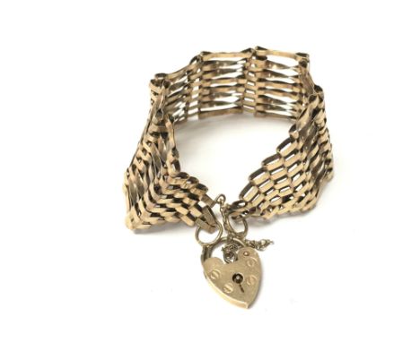 A 9ct gold gate bracelet. 15.38g