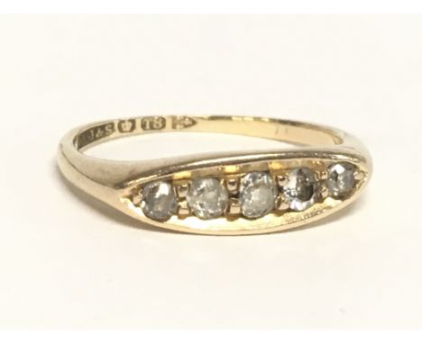 An 18ct gold five stone diamond old cut ring, Size N weight 3.3g postage category A