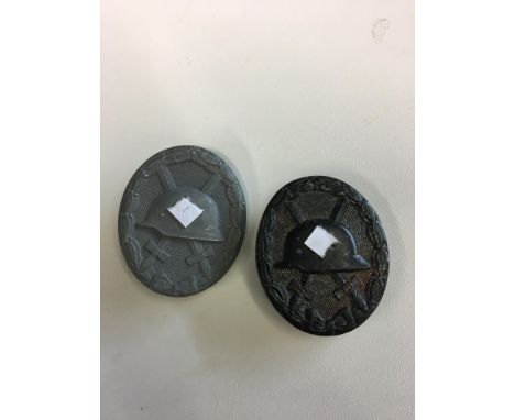 Wound badges in black and silver. 