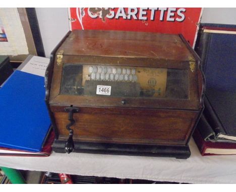 A 19th century roller organ by the Autophone Co., New York, in working order.46 x 38 x Height 32cm Roll length 6 3/8 inch. On