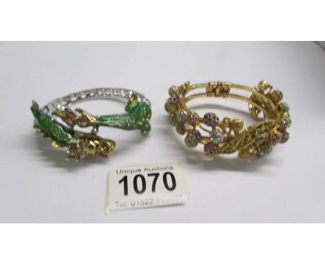A dragon fashion bangle and one other.