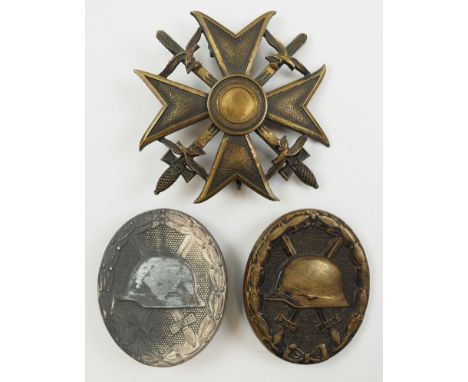 Nachlass eines Spanienkämpfers.1.) Spanienkreuz, in Bronze, mit Schwertern, 2.) Verwundetenabzeichen, 1939, Silber, Herstelle