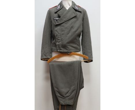 Wehrmacht: Uniformensemble - Sturmgeschütz Uniform für einen Oberleutnant.1.) Jacke: Feldgraues Tuch, Brustadler in Metallfad