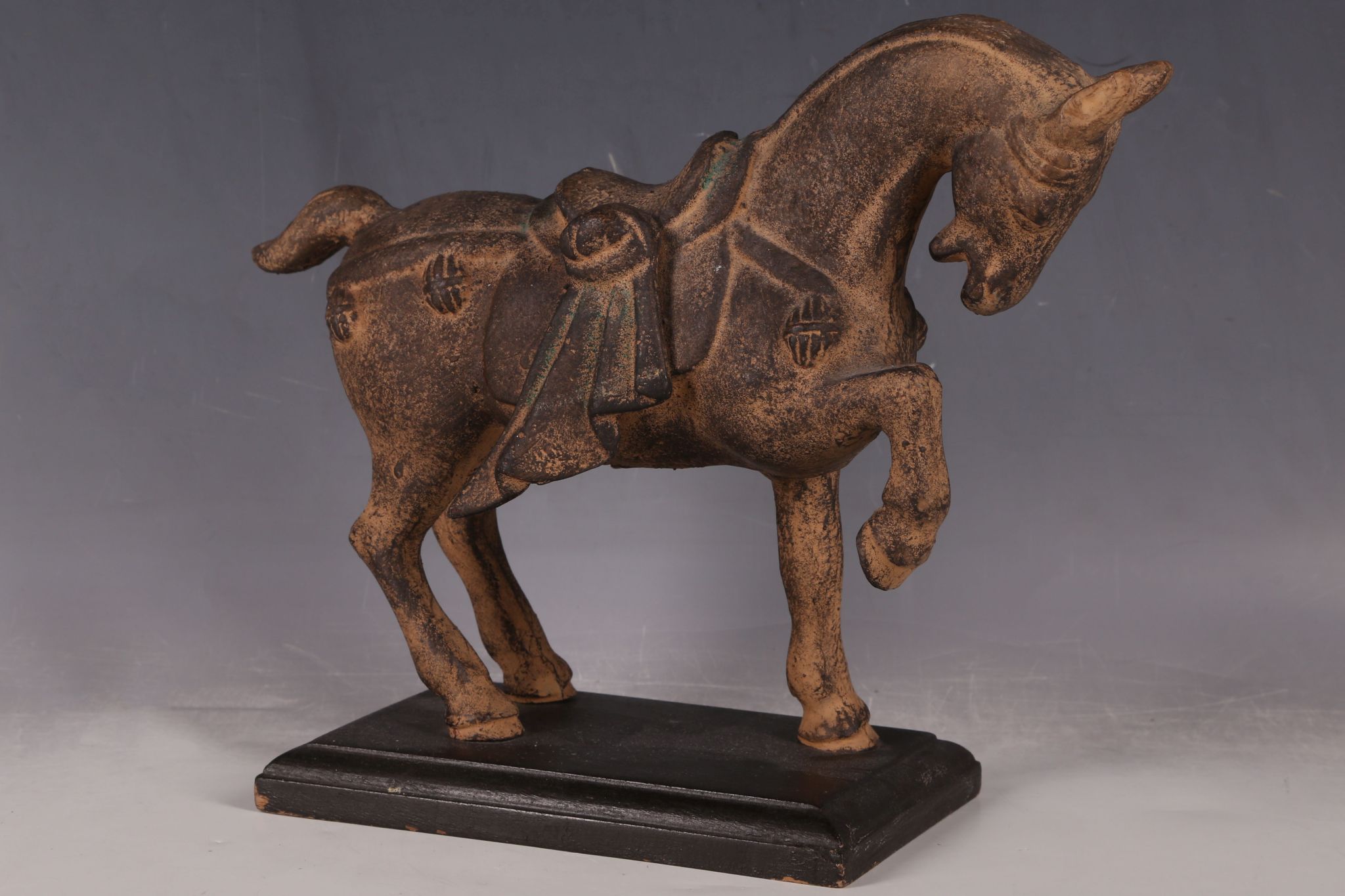 A metal casting of a Tang dynasty horse, 20.5cm.
