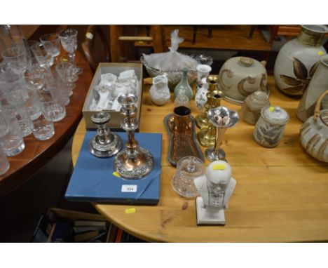 A small bust in the form of Winston Churchill; a pair of Victorian brass candlesticks; silver plate on copper candlestick; We