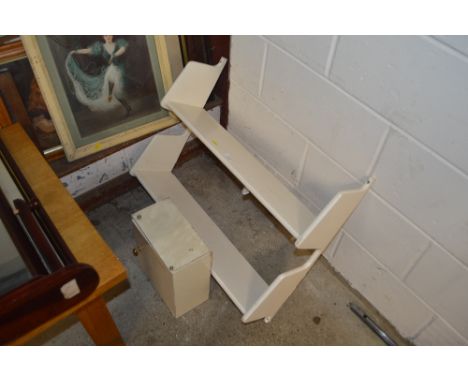 A white painted two tier wall shelf and a medicine cabinet 