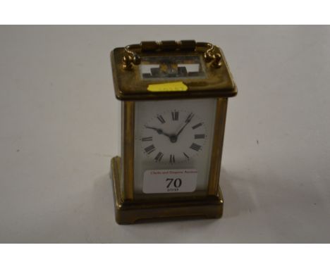 A brass cased carriage clock 