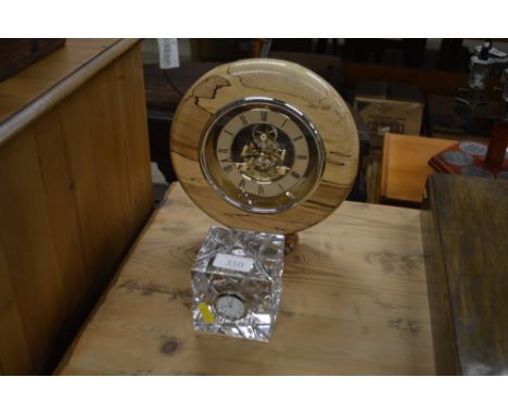 A square glass mantel clock and one other mantel clock with visible escapement 