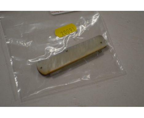 A Georgian silver and mother of pearl folding moustache comb