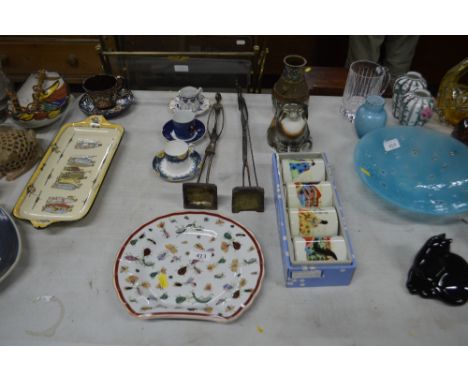 Two African figures; a Chinese plate decorated with insects; three coffee cans and saucers; a USSR cat etc.