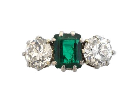 An emerald and diamond three stone ring, the rectangular cut emerald weighing approx. 1ct, with old cut diamond sides, estima