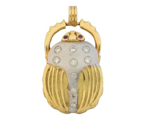 A ruby and diamond scarab pendant, of bi-colour design, the scarab with brilliant cut diamond accents and circular shape ruby