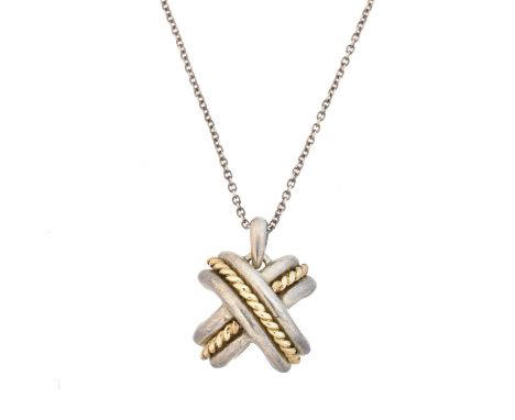 A Tiffany &amp; Co. silver and gold cross pendant, signed and dated T&amp;Co., 1990, stamped 925 and 750, length of pendant 1