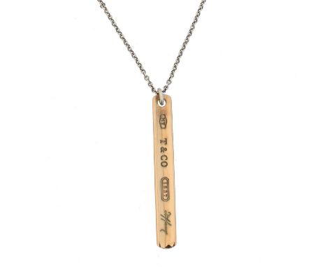 A Tiffany &amp; Co. '1837' pendant, the bar pendant in maker's Rubedo metal, suspended from a trace link chain, signed Tiffan