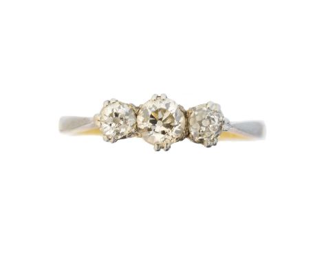 A diamond three stone ring, the old cut diamond line with tapered shoulders, estimated total diamond weight 0.60ct, estimated