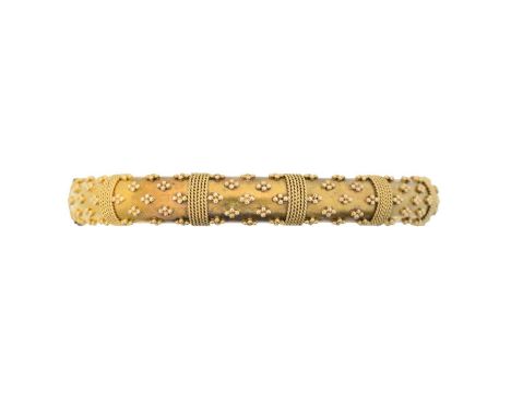A Victorian Etruscan Revival hinged bangle, with bead and wirework detailing, to the plain reverse, stamped 15, inner diamete