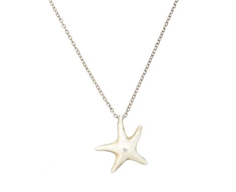 A silver 'Starfish' necklace by Elsa Peretti for Tiffany & Co., the polished starfish pendant suspended from a trace link cha