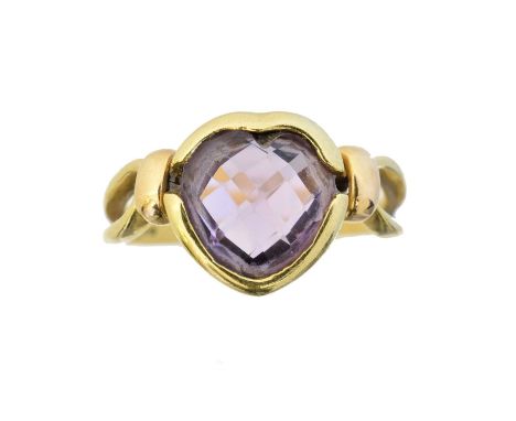 An 18ct gold amethyst dress ring, the fancy heart shape amethyst with openwork shoulders, Italian assay marks, ring size P, g