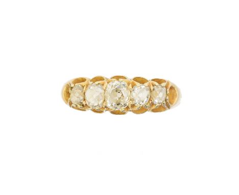 An early 20th century 15ct gold diamond five stone ring, the old cut diamond line with tapered shoulders, estimated total dia