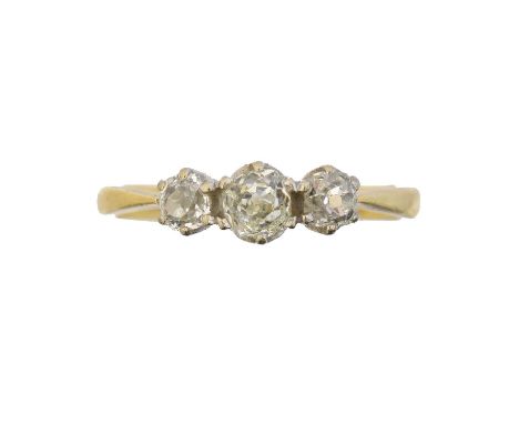 An 18ct gold diamond three stone ring, the brilliant cut diamond line within claw settings, estimated total diamond weight 0.