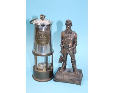 A Robert Olley Coal Mining figure and an Eccles Miners lamp