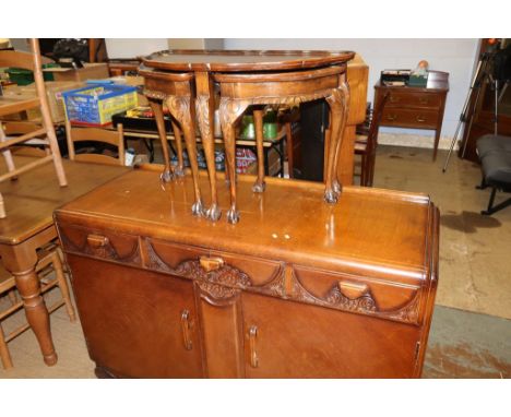 An oak sideboard, walnut half moon table, a Grandmother clock and a treddle sewing machine