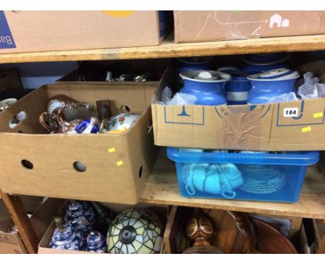 A shelf of assorted, to include T and G Green