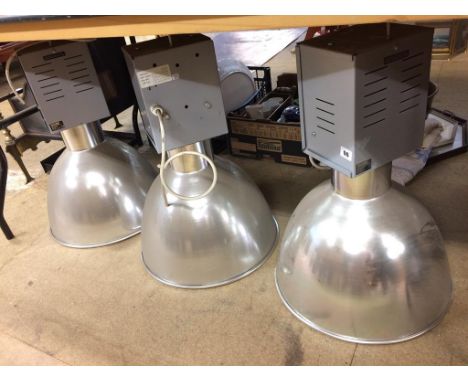 Three industrial light fittings