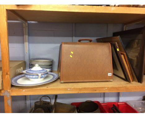 A sewing machine and prints etc.