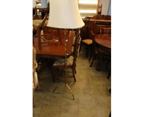 A brass faux bamboo standard lamp