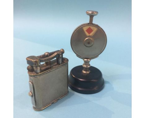 A Dunhill lighter and an aide memoire
