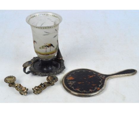 An early 20th century hallmarked silver and tortoiseshell backed hand mirror, London c.1915 (date later obscured), a plated c