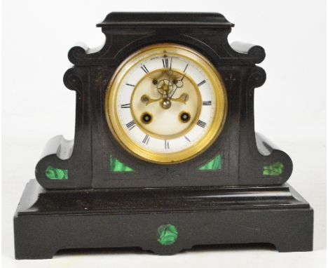 A late 19th century French black slate mantel clock with circular white enamel chapter set with Roman numerals, width 29.5cm.