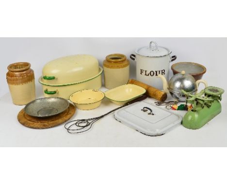 A large collection of kitchenalia including an enamelled tin bread bin with cover, a similar circular flour bin, a set of sca