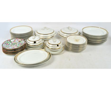 A Losolware dinner service decorated with gilt Greek key rims, comprising twelve dinner plates, twelve dessert plates, twelve