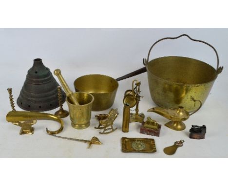 A quantity of mainly brass items including a jam pan, a pestle and mortar, an Alibaba lamp, scales, a dish, candlesticks, etc