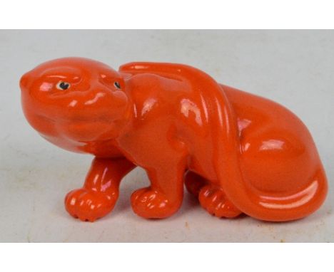 A Royal Worcester "Leopard" netsuke figure painted in bright orange, green printed marks to base, date code obscured but c.19