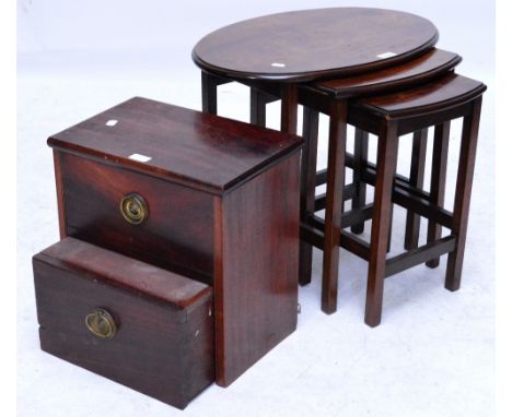 A nest of three walnut occasional tables, and a simple step stool (2).
