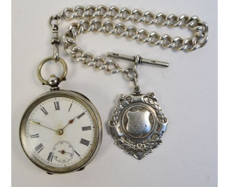 An early 20th century Swiss silver cased open face key wind pocket watch, the circular enamel dial set with Roman numerals an
