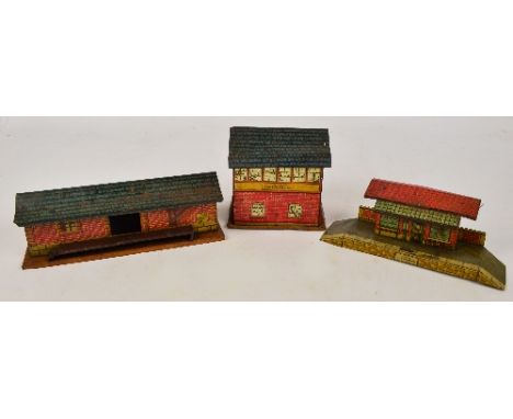 A vintage tin railway waiting room and platform, a "Brook Road" signal box, and a rail depot building, length 27cm (af) (3). 