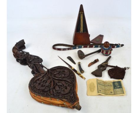 A quantity of collectors' items including a pair of carved bellows with long pierced handles, with floral decoration, length 
