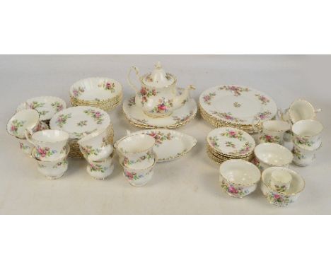 A quantity of Royal Albert tea, dinner and coffee ware in Moss Rose pattern, comprising six small dinner plates, one oval dis