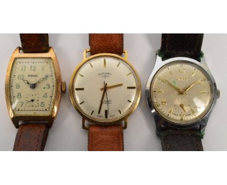 HIRCO; a 9ct yellow gold manual wind gentleman's wristwatch, the tonneau shaped dial set with Arabic fluorescent numerals and