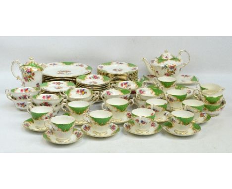 A Paragon "Rockingham" pattern dinner and teaware, comprising twelve dinner plates, twelve side plates, twelve twin handled s