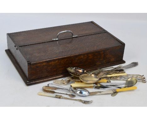 A quantity of electroplated cutlery and flatware comprising a set of ivorine handled knives and forks, antler handled carving