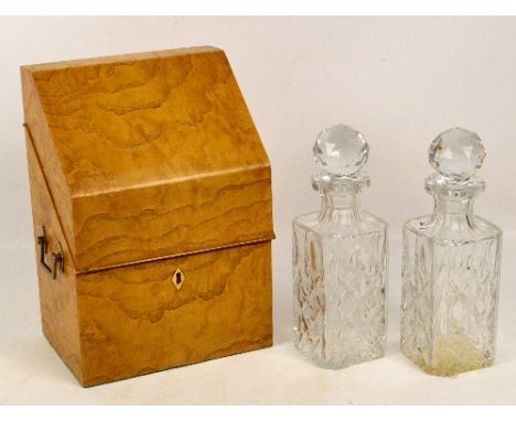 A 20th century Hungarian ash decanter case with twin brass handles and inlaid lozenge shaped escutcheon, the sloping hinged l