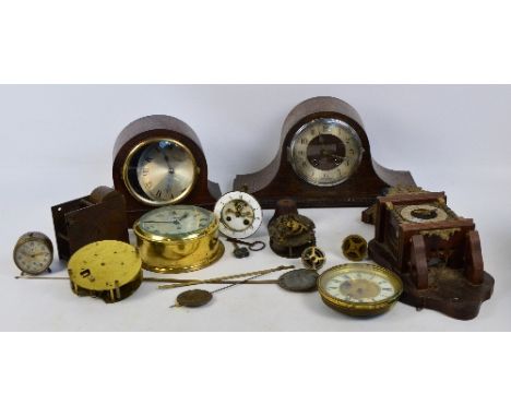A quantity of clocks, movements, and other parts for restoration including mantel clocks, a brass circular wall clock, pendul