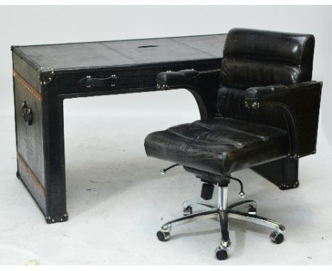 A contemporary Halo faux crocodile black leather three drawer desk with matching swivel chair, the desk 148 x 79cm. CONDITION